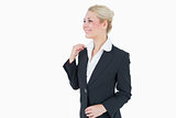 Happy young business woman looking away