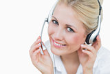 Closeup portrait of young female executive wearing headset