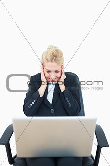 Successful young business woman with laptop