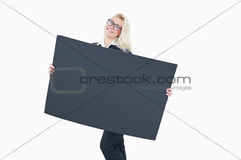 Young business woman holding a blank board