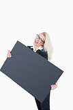 Portrait of cheerful business woman holding empty banner