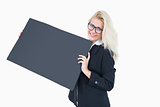 Portrait of business woman holding empty banner