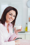 Young woman with glass of milk