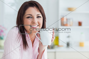 Young woman with coffee cup