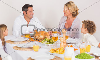 Family talking together before to eat