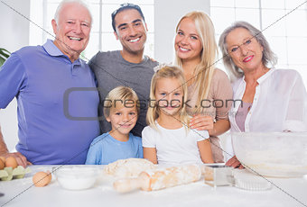 Family posing in the kitchen
