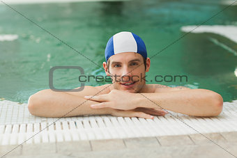 Smiling man in the pool