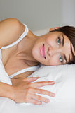 Woman smiling in bed