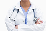 Female doctor in lab coat wearing stethoscope around neck