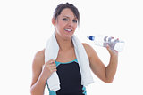 Portrait of woman in sportswear drinking water