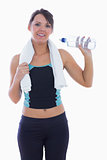 Portrait of woman in sportswear drinking water