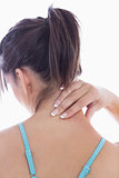 Rear view of young woman with neck pain