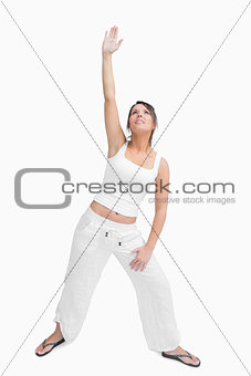 Young woman performing stretching exercise