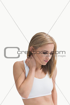 Young woman with severe neck pain