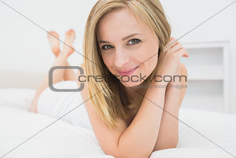 Closeup of beautiful relaxed woman in bed
