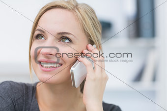 Closeup of business woman using mobile phone