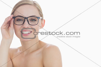 Closeup portrait of attractive young woman wearing glasses