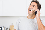 Man laughing on the phone