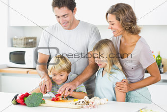 Family preparing vegetables together