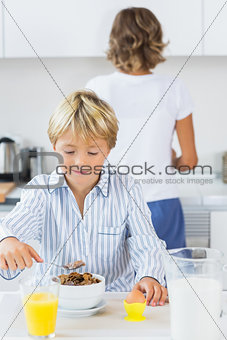 Young boy having breakfast