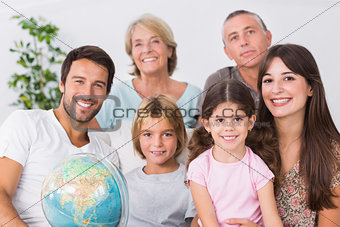 Cheerful family sitting on couch