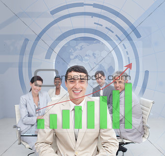 Digital screen showing the green graph to a business team