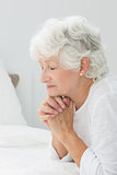 Aged woman praying