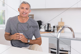 Man holding a cup