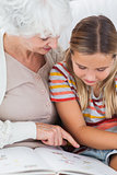 Girl reading with granny