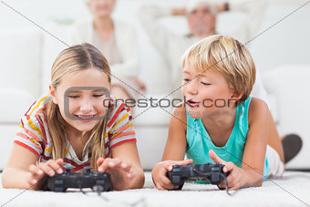 Siblings playing video games