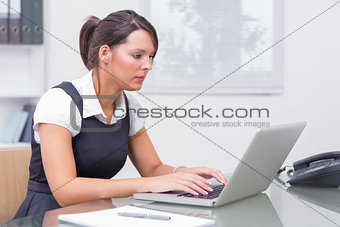 Woman working on her computer