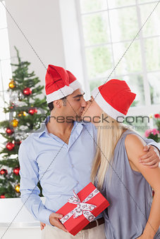 Kissing couple at christmas