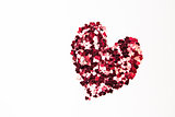Pink and red confetti in heart shape