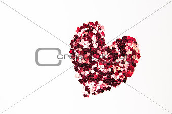 Pink and red confetti in heart shape