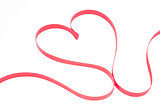 Pink ribbon shaped into heart