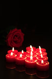 Romantic candles with red rose