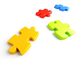 Parts of a puzzle with funny colors on a white background