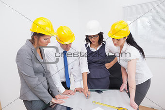 Team looking at a construction plan