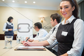 Smiling businesswoman during a presentation