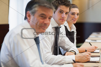 Happy business people at a meeting
