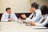 Smiling business people having a meeting