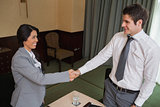 Business people shaking hands at meeting