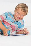 Happy boy using a tablet