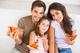 Family eating pizza