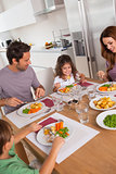 Family eating healthy dinner