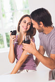 Smiling couple with wine