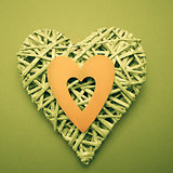 Wicker heart ornament with yellow paper cut out