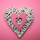 Wicker heart ornament with pink paper cut out