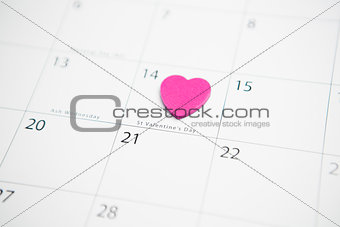 Pink heart marking valentines day on calendar