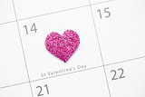 Pink glittering heart marking valentines day